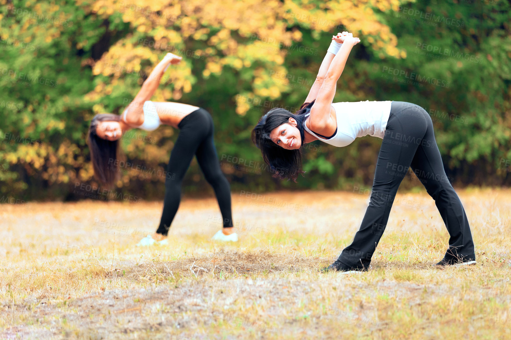 Buy stock photo Women, yoga stretching and portrait in a outdoor park for exercise and fitness. Health, wellness and arm warm up of female friends in nature on grass feeling happy with smile from body care and sport