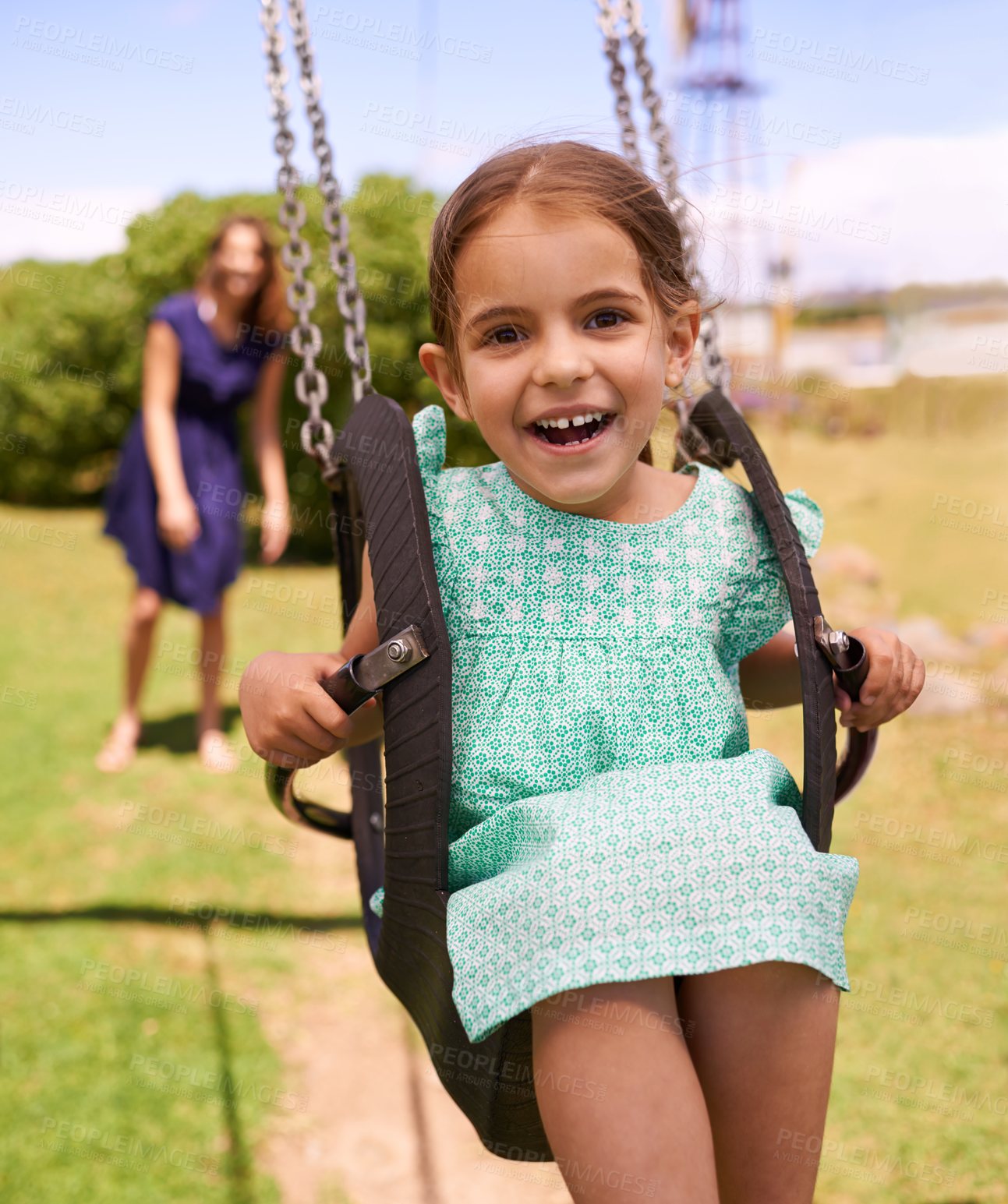 Buy stock photo Portrait, happy little girl ride on swing and in the park watching sunset. Cute toddler, having fun woman swinging her daughter and in kindergarten or leisure activity and weekend summer playground