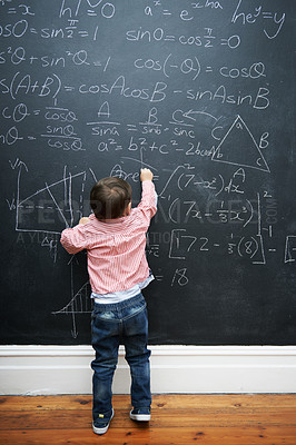 Buy stock photo Child, math and blackboard with writing in classroom for knowledge, development and young genius in school. Kid, numbers and formula on chalkboard with learning for education, growth and solution