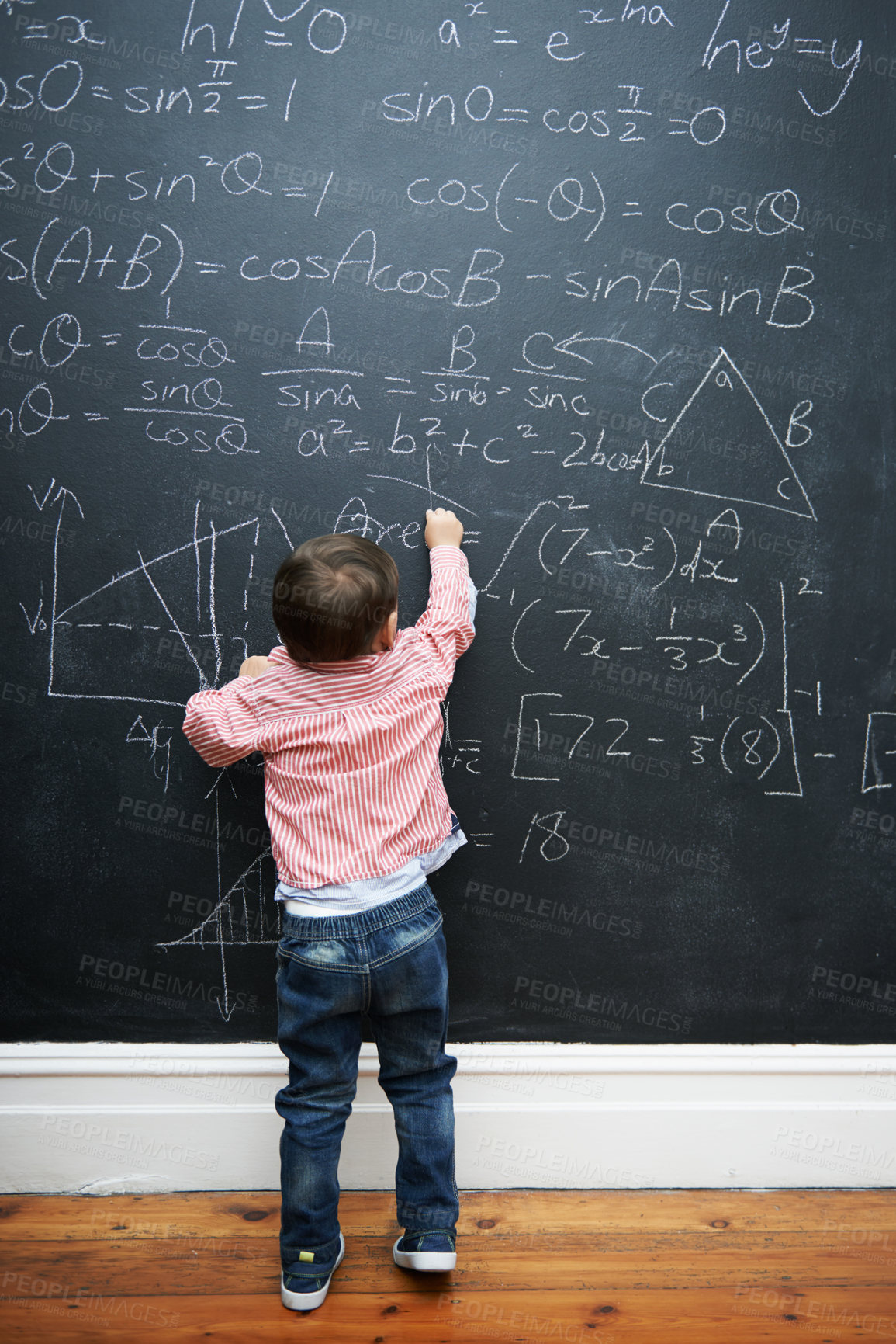 Buy stock photo Child, math and blackboard with writing in classroom for knowledge, development and young genius in school. Kid, numbers and formula on chalkboard with learning for education, growth and solution