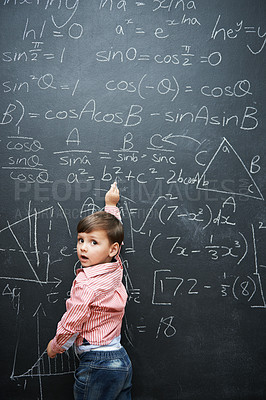 Buy stock photo Smart, math and child writing on chalkboard in school or classroom for learning, education or solution. Genius and clever kid, boy or student with equation, numbers and test for IQ or intelligence