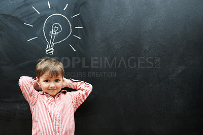 Buy stock photo Student, child and chalkboard with lightbulb for solution, learning and creative ideas in school on mockup space. Portrait of a kid, learner or boy with light bulb, emoji and blackboard for knowledge