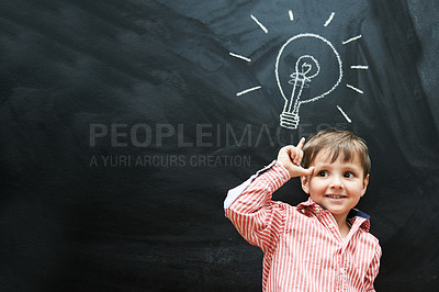 Buy stock photo Child, thinking and lightbulb on chalkboard for solution, learning and creative mindset in school on mockup space. Happy kid, student or boy with light bulb, emoji and blackboard of knowledge or idea