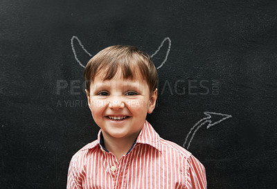 Buy stock photo Person, portrait and chalk with devil on board with smile in class, school and drawing for young skill development. Child, blackboard and creativity for learning, education and growth with happiness