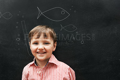 Buy stock photo Person, portrait and chalk with fish on board with smile in class, school and drawing for young skill development. Child, blackboard and creativity for learning, education and growth with happiness