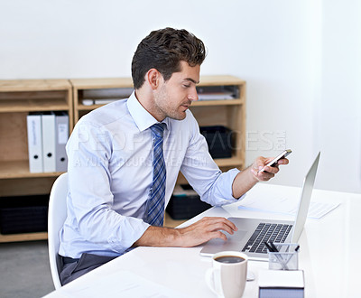 Buy stock photo Scroll, office and businessman with phone, laptop and coffee at startup with technology. Browse, online and business analyst at desk with computer, smartphone and internet connection for networking.