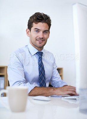 Buy stock photo Businessman, portrait and smile at computer in office for as online researcher, brainstorming or project planning. Male person, face and desk in California or confident or company, website or pride