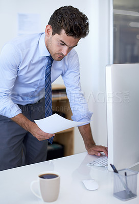Buy stock photo Businessman, computer and paperwork in office for online research for feedback review, planning or brainstorming. Male person, document and financial consultant for budget, accounting or investing