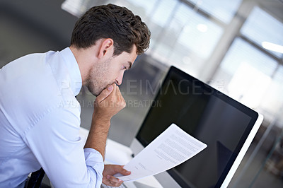 Buy stock photo Employee, business and man reading contract, feedback for a project or financial report in workplace. Accountant, consultant or adviser with document or paperwork with review, application or thinking