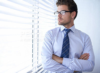 Buy stock photo Businessman, face and serious with arms crossed in office for professional career in finance, thinking and confidence. Entrepreneur, person and employee with relax, glasses and corporate at work