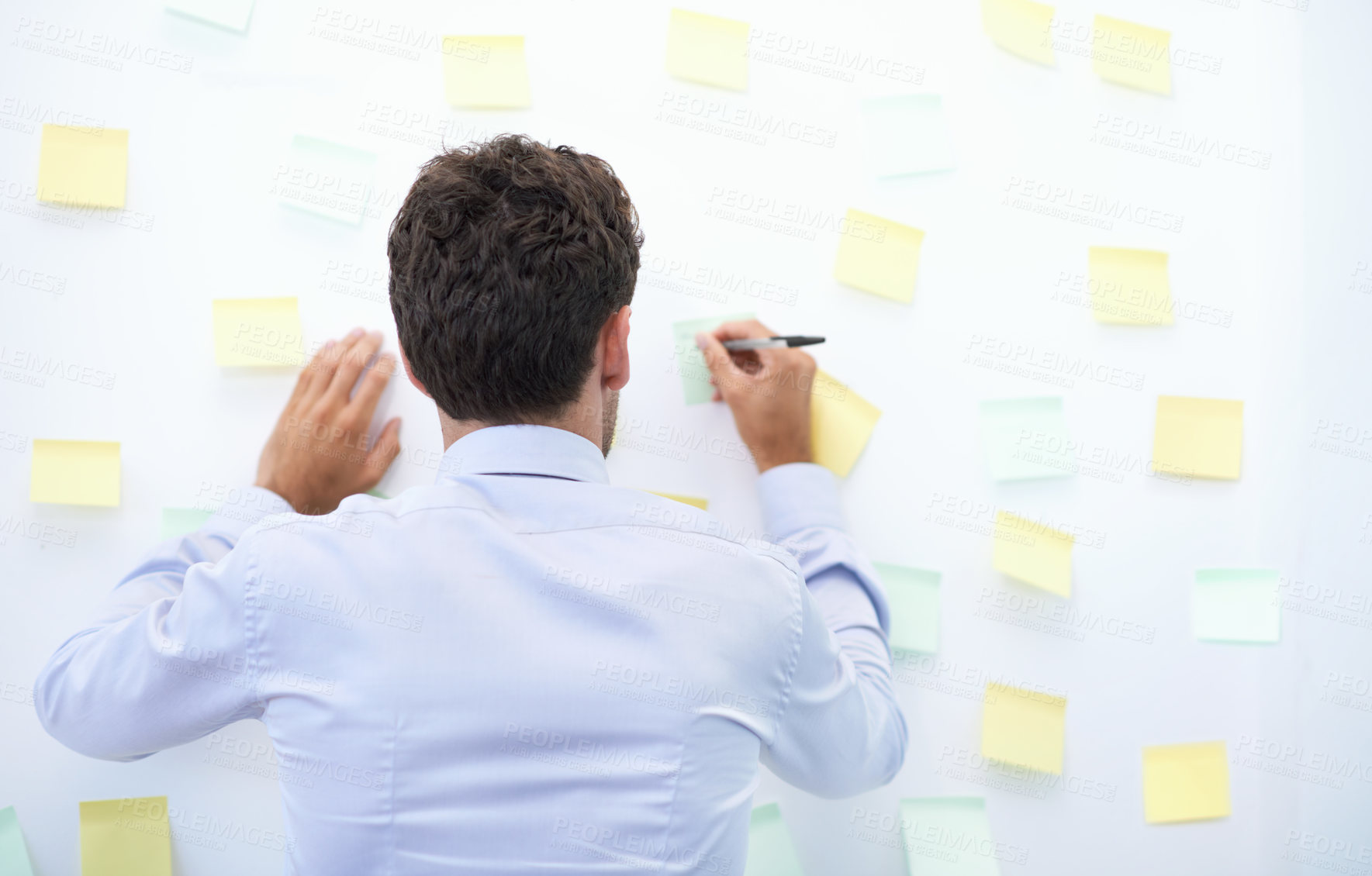 Buy stock photo Businessman, writing and sticky notes in office for strategy, brainstorming and project planning with rear view. Entrepreneur, employee and ideas for agenda, schedule and proposal information at work