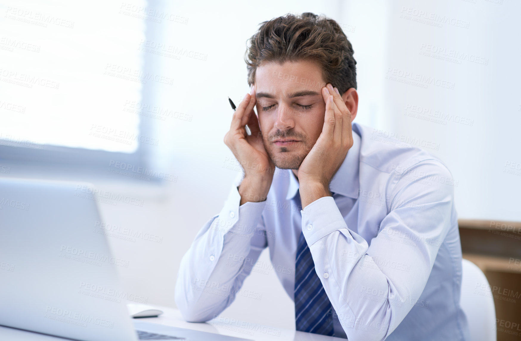 Buy stock photo Headache, pain and business man with stress, fatigue and anxiety for overwork in office. Migraine, depression and professional massage temples for burnout, sick and tired agent frustrated by laptop