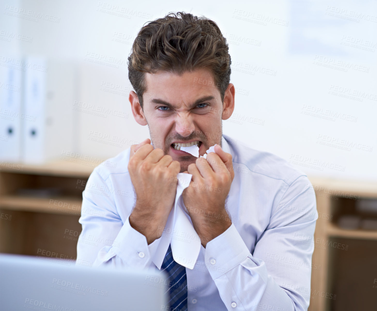 Buy stock photo Businessman, stress and paper in mouth for anger, overwhelmed and burnout at workplace. Professional man, overworked and frustrated with document in office for project, deadline or administration