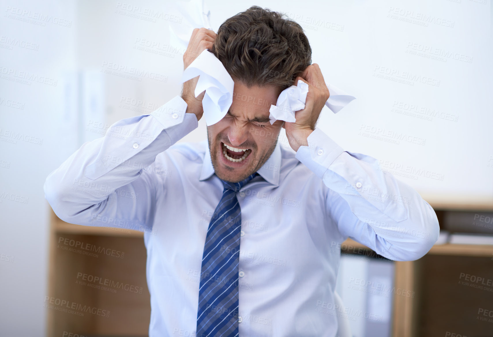 Buy stock photo Businessman, head and angry with crumpled paper, burnout and mistake for frustration, debt and headache. Stressed employee, worker and report for bills, worried and failure with audit or deadline