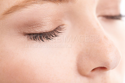 Buy stock photo Closeup studio shot of a model with her eyes closed