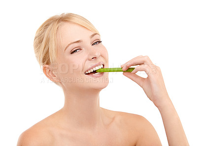 Buy stock photo Woman, eating celery for health and nutrition, detox or diet with wellness and smile isolated on white background. Vegan, vegetable and vitamin A with food for physical wellbeing and lose weight