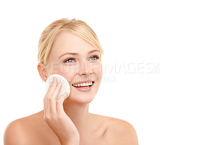 Buy stock photo Skincare, cotton pad and woman in studio with natural, health and beauty face routine. Wellness, smile and female model from Australia with facial dermatology tool for treatment by white background.