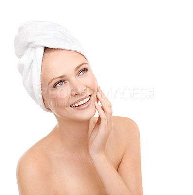 Buy stock photo Smile, skincare and woman touch face, beauty or cosmetics in studio isolated on a white background. Spa, hand and happy person with towel in treatment for dermatology, soft skin or thinking of makeup