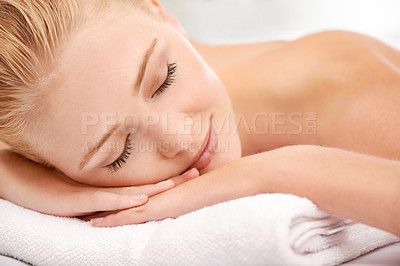 Buy stock photo Relax, sleep and face of woman at spa for luxury holistic treatment, facial health and professional massage therapy. Self care, peace and refresh for girl on bed with body wellness, rest and hotel.