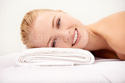 Buy stock photo Portrait of a woman lying on a massage table at a spa