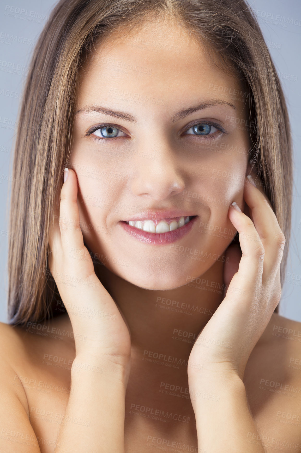 Buy stock photo Woman, skincare and happy with portrait in studio for facial treatment, beauty glow and dermatology. Model, person and face with confidence for cosmetics, healthy skin and wellness on blue background