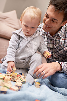 Buy stock photo Happy father, baby and playing with blocks in home with love, pride and learning shapes or color in living room. Dad, daughter and educational toy for creativity and development of fine motor skills
