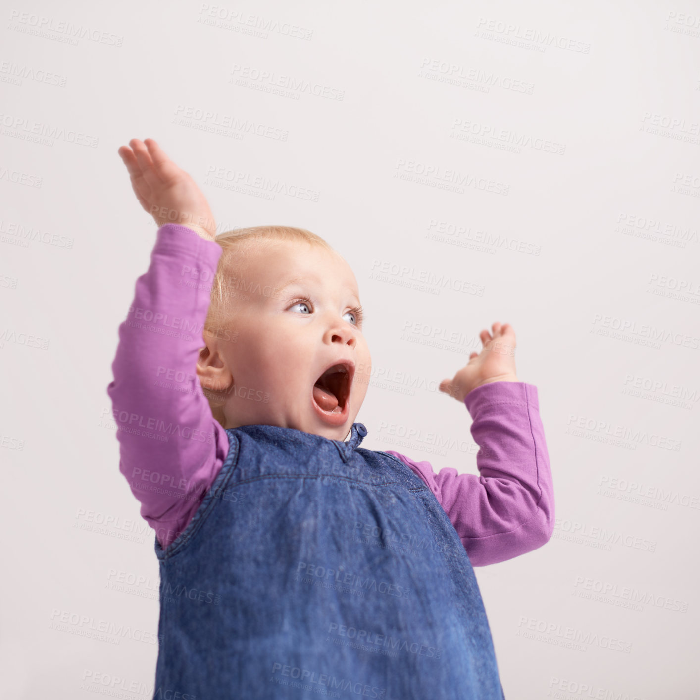 Buy stock photo A shot of a baby girl with a startled expression