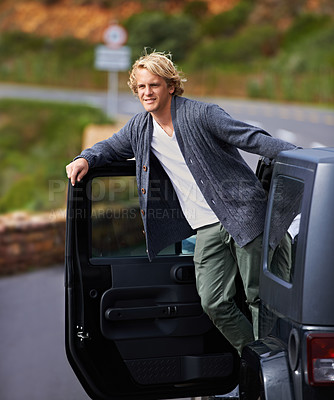 Buy stock photo Man, car and leaning out door on road trip for travel, break or stop in nature or sightseeing. Young or handsome male person, tourist or traveler exploring or enjoying view or holiday from vehicle