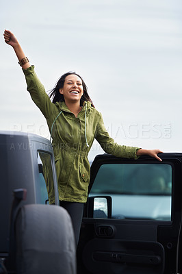 Buy stock photo Happy woman, road trip and freedom with car for travel, drive or final stop at destination. Excited young female person with smile in satisfaction and leaning on vehicle door for outdoor adventure