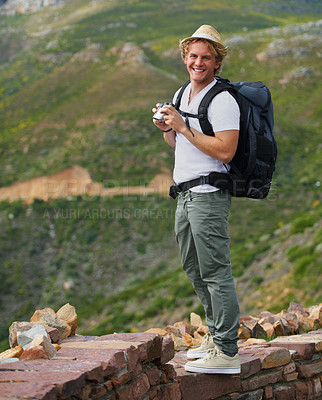 Buy stock photo Happy man, portrait and hiker with binoculars and bag for sightseeing, outdoor travel or hiking in nature Young male person or tourist with hat, backpack or optical tool for view, scope or exploring