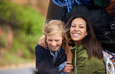Buy stock photo Happy woman, friends and hug with a car full of luggage for road trip, holiday weekend or outdoor vacation. Female person with smile for friendship, support or care together on adventure or journey