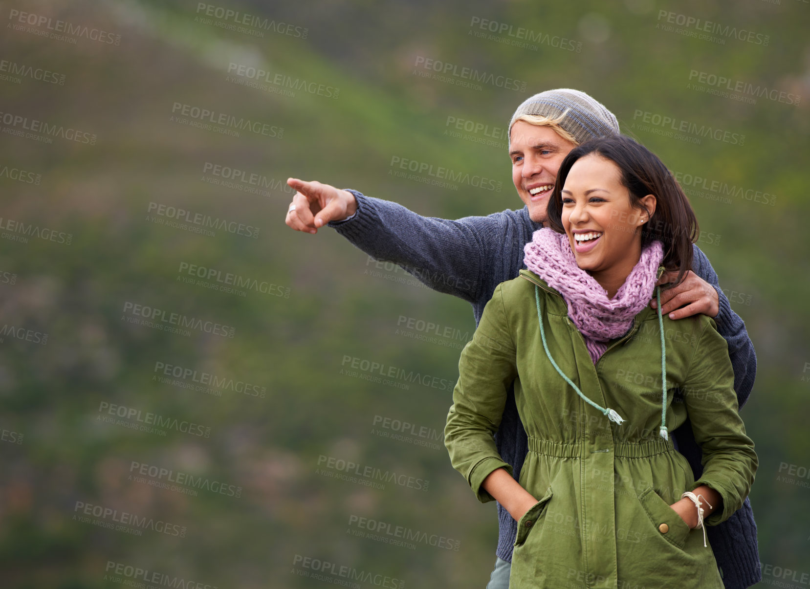 Buy stock photo Happy couple, pointing and nature in adventure for sightseeing, journey or outdoor view together. Man and woman with smile enjoying holiday, vacation or getaway in natural environment on mockup 