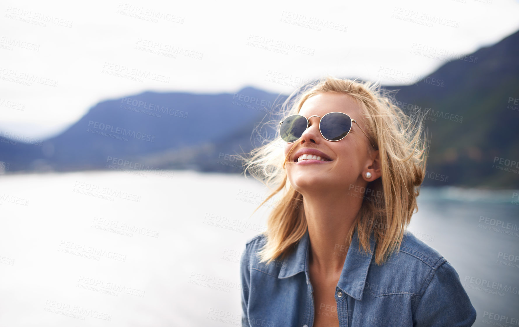 Buy stock photo Girl, smile and peace in nature for mountain as tourist in Cape Town to relax and sun. Female person, happiness and excited for adventure on excited in trip for holiday, lake and cheerful for hiking