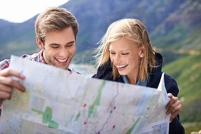 Buy stock photo Happy people, friends and map with location for travel or destination on mountain in nature. Young couple with smile, document or geographic paper with routes for navigation, help or outdoor tourism