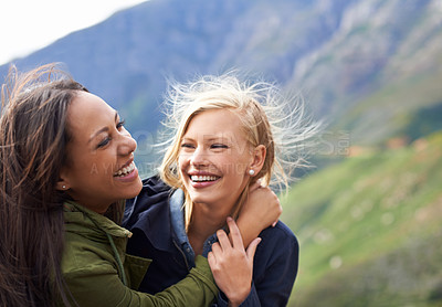 Buy stock photo Happy woman, friends and laughing with hug in nature for funny joke, humor or bonding together. Female person with smile for embrace, care or support on holiday weekend, travel or outdoor vacation