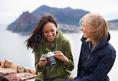 Buy stock photo Happy woman, friends and laughing with camera for funny joke, photography or moments together in nature. Female person with smile for photo, picture or memories of fun outdoor holiday or adventure