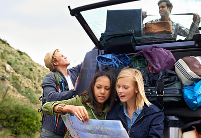 Buy stock photo Friends, group and car with map for travel in mountain with bag luggage in trunk for bonding vacation, journey or explore. Men, women and location search in Italy for camping, adventure or holiday