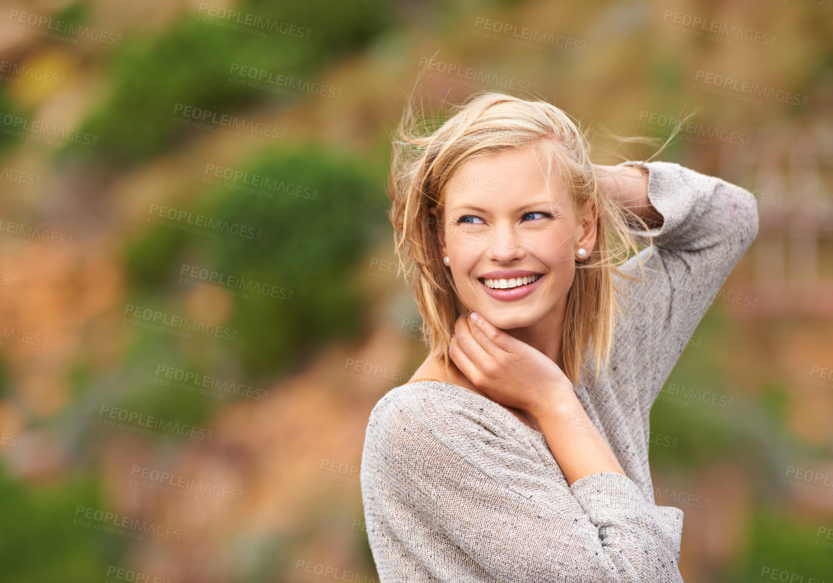 Buy stock photo Woman, nature and wind for outdoor travel on holiday vacation with smile for adventure, journey or summer. Female person, happy and breeze in California park for explore outside, paradise or freedom