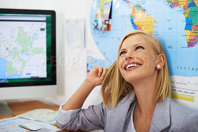 Buy stock photo Travel agency office, business agent and woman thinking of trip plan, global tour or inspiration for world journey, route or holiday. Tourism, map planning and happy female worker contemplating idea