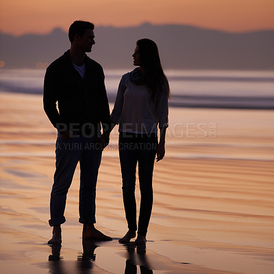 Buy stock photo Couple, holding hands on beach and sunset, nature and travel with bonding for love and commitment outdoor. People with support, trust and loyalty with adventure together for honeymoon or anniversary