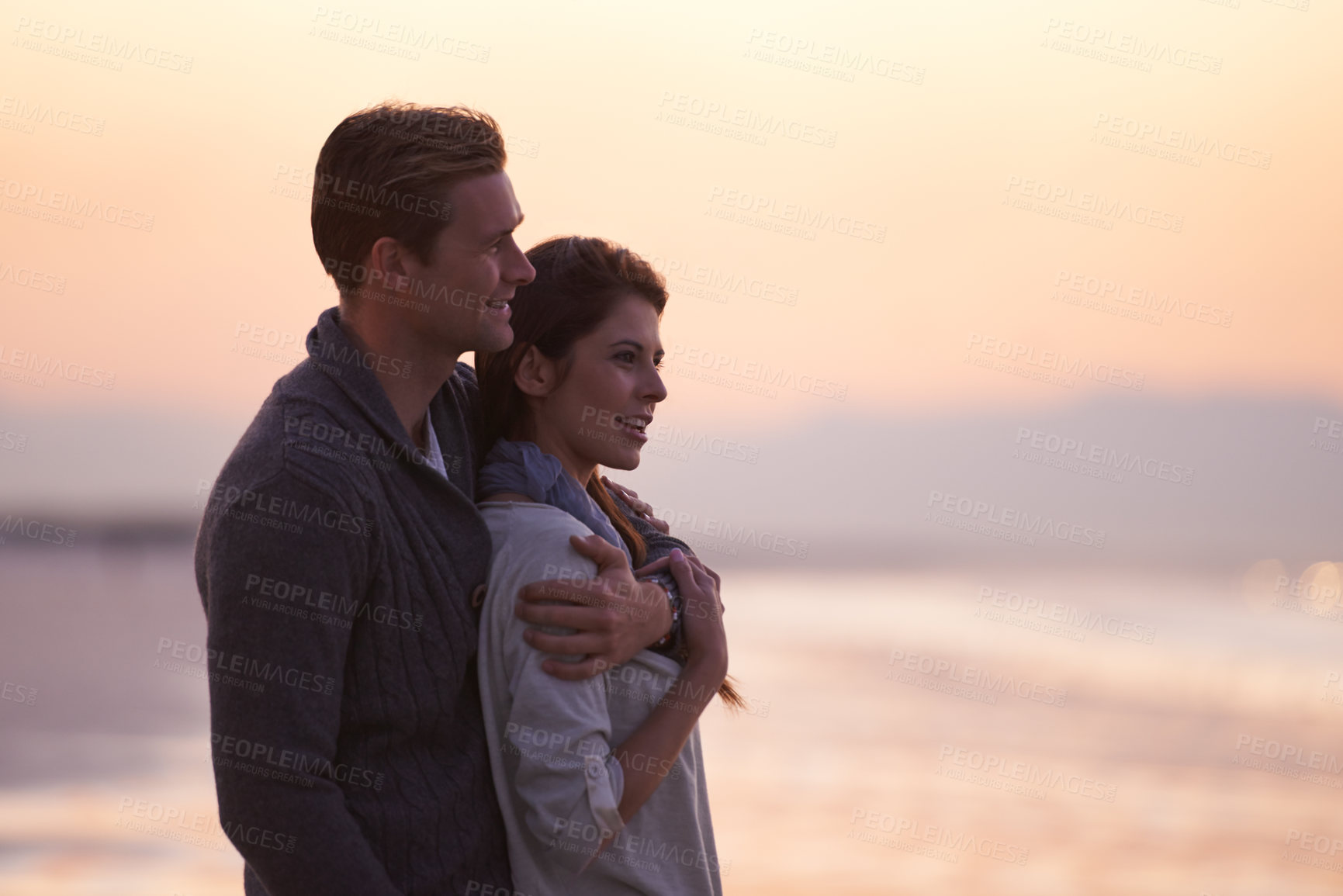 Buy stock photo Couple, love and embrace on beach at sunset with happiness together on holiday in Florida. Travel, vacation and man hug woman outdoor on date in summer with care, support and kindness in marriage