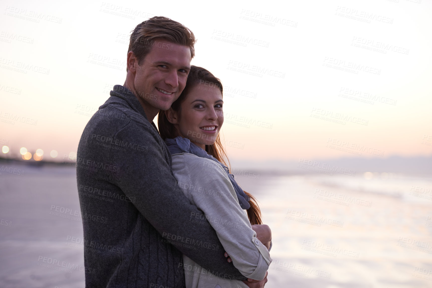 Buy stock photo Couple, hug and portrait on beach at sunset with happiness together on holiday in Florida. Travel, vacation and man embrace woman outdoor on date in summer with care, support and love in marriage