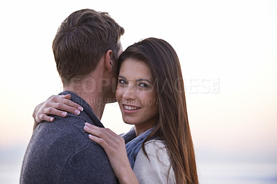Buy stock photo Love, embrace and portrait of couple on beach at sunset for tropical holiday adventure, relax and bonding together. Evening, happy man and woman on romantic date with ocean, sky and hug on vacation.