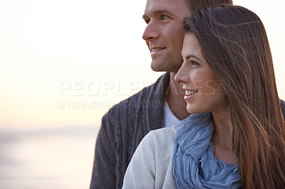 Buy stock photo Couple, thinking and hug with love outdoor at sunset planning future holiday together in Florida. Travel, ideas and man with woman on beach, vacation or date in summer with support in marriage