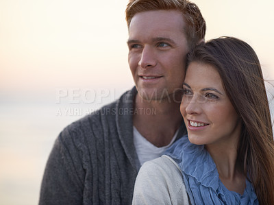 Buy stock photo Couple, hug and thinking with love outdoor at sunset planning future holiday together in Florida. Travel, ideas and man with woman on beach, vacation or date in summer with support in marriage