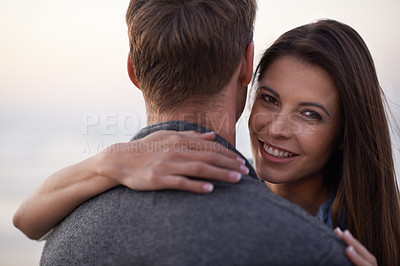 Buy stock photo Love, hug and portrait of happy woman with man at sunset for holiday adventure, relax and bonding together. Smile, romance and couple on outdoor date with evening sky, embrace and vacation in nature