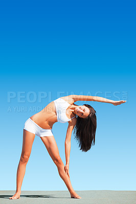 Buy stock photo Woman, yoga and stretching arms for body, workout or exercise standing on floor against blue sky. Calm and peaceful female yogi in warm up arm or fitness stretch for healthy living on mockup space