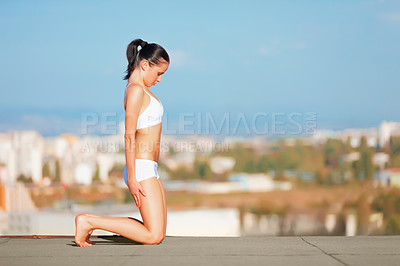 Buy stock photo Woman, yoga and stretching body on roof top for exercise, zen workout or fitness outdoors. Female yogi in warm up stretch for healthy wellness, training or balanced lifestyle outside town on mockup