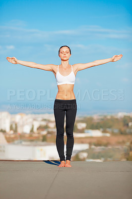 Buy stock photo Calm woman, yoga and open arms on roof top in exercise, zen workout or fitness outdoors. Female yogi in warm up stretch or pose for healthy body, spiritual wellness or balanced mind outside town