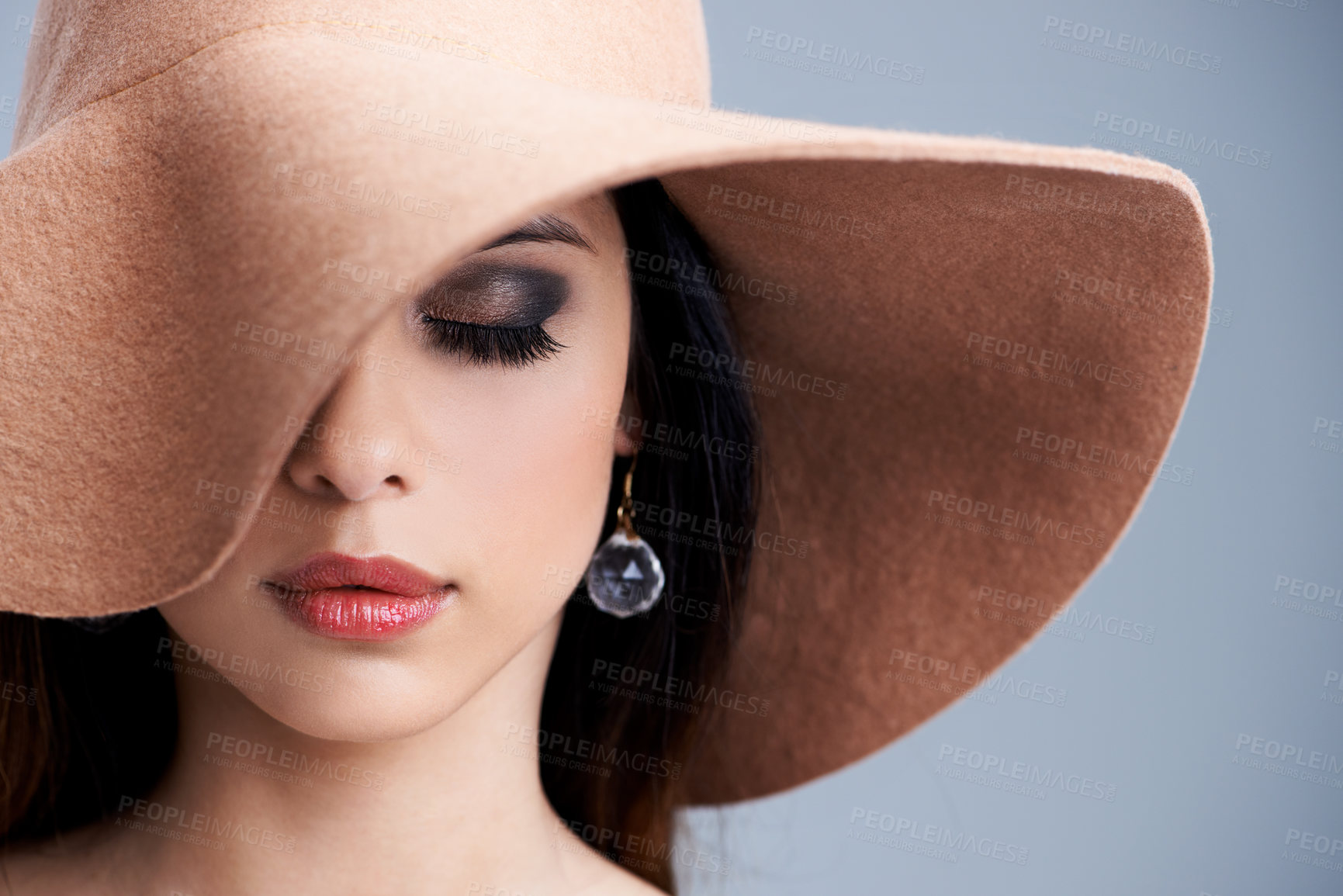 Buy stock photo Beauty, makeup and woman in hat with glamour, confidence and vintage style in studio. Classic, chic and elegant model in cool aesthetic with girl on grey background for luxury, grace and cosmetics.